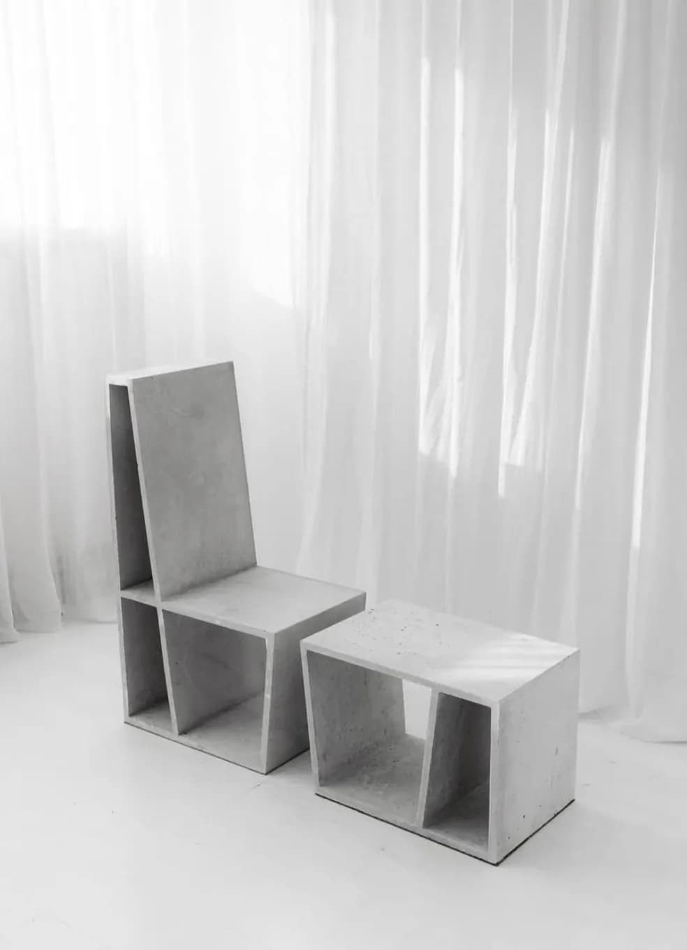 Brushed metal side table, three-quarter view